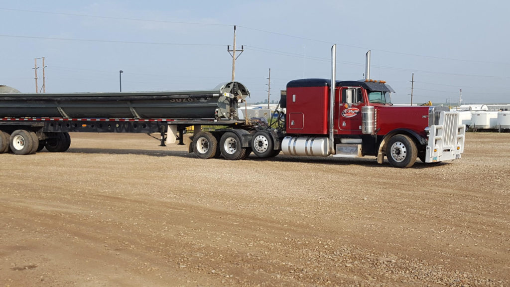 A red tank truck
